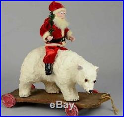 1900 Antique German Belsnickle Santa Claus riding a Fur Polar Bear Pull Toy