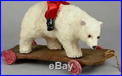 1900 Antique German Belsnickle Santa Claus riding a Fur Polar Bear Pull Toy