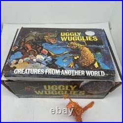 (36) Vintage Ugly Wuggly Wugglies Monster Dinosaur Toy Figure Lot New Case