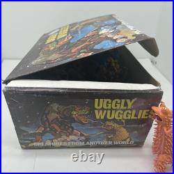 (36) Vintage Ugly Wuggly Wugglies Monster Dinosaur Toy Figure Lot New Case