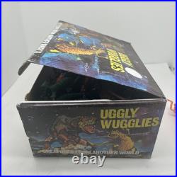 (36) Vintage Ugly Wuggly Wugglies Monster Dinosaur Toy Figure Lot New Case