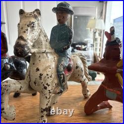 7 vintage cast metal/lead toy figures