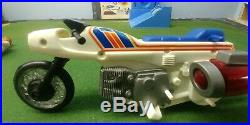 70's VINTAGE EVEL KNIEVEL Figure + Jet Cycle + Blue Launcher + original ad