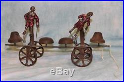 Antique Bell pull toy 1890s Boy and Girl figures, with weights that hit Bells