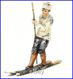Unusual Heyde figure of a boy on an old style sled, winter or Christmas figure