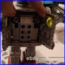Vintage Tin Robot Toy Silver Battery Operated Opening Chest Red Feet