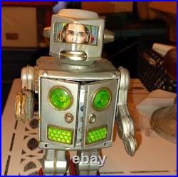 Vintage Tin Robot Toy Silver Battery Operated Opening Chest Red Feet