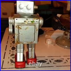 Vintage Tin Robot Toy Silver Battery Operated Opening Chest Red Feet