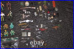 Vintage mixed toy lot featuring GI JOE, Battle Beast, and various accessories