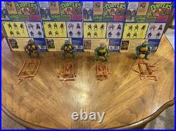 Vtg 1988 complete TMNT Set 4 Figures Lot W 10 Back Cardback w weapon racks