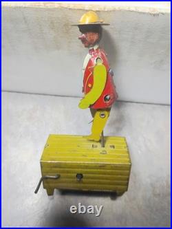 Vtg Tin toy Germany 1920's era Figure on pole dancing
